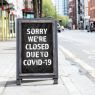 picture of closed sign because of covid