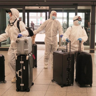 picture of guys in hazmat suits